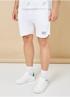 Buy Pure Cotton Terry Tennis Regular Shorts with Patch Detail in Saudi Arabia