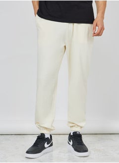 Buy Solid French Terry Relaxed Fit Joggers in Saudi Arabia