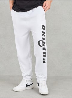 Buy Text Placement Print Oversized Terry Joggers in Saudi Arabia