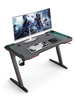 Buy Black Gaming Desk 140x60x74cm RGB Lighting Home Office Ergonomic Gamer Computer Desk Workstation Carbon Fibre Surface Cup Holder and Headphone Hook in Saudi Arabia