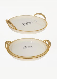 Buy A set of two-piece circular serving trays with an elegant wavy design, sugar/gold in Saudi Arabia