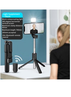 Buy Mobile phone bluetooth selfie stick extended mini handheld all-in-one desktop tripod stand in Saudi Arabia