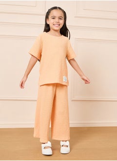 Buy Textured Patch Detail T-shirt and Wide Leg Pant Set in Saudi Arabia