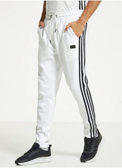 Buy Logo Striped Joggers in UAE