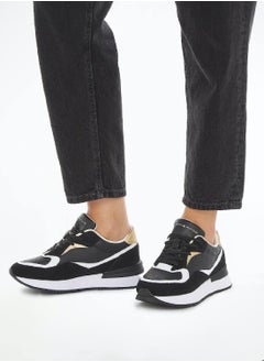 Buy Women's Th Monogram Leather Runner Trainers -  Leather upper, Black in UAE