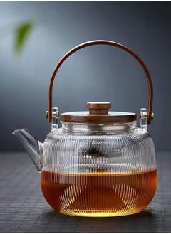 Buy 800ML walnut glass teapot for steaming and cooking, vertically patterned tea pot with high borosilicate content, can be used for thermal power steaming and cooking, making it a great gift in UAE