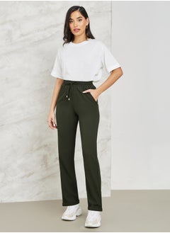 Buy Textured Tapered Fit Pants with Pockets in Saudi Arabia