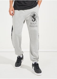 اشتري House of Dragon Graphic print Oversized Terry Jogger with side contrast في السعودية