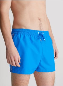 Buy Men's Short Drawstring Swim Shorts - Logo Tape - Polyester, Blue in UAE