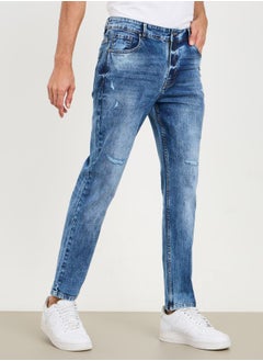 Buy Distressed Mid Wash Slim Fit Jeans in Saudi Arabia