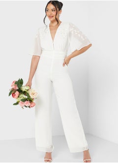 Buy Embellished Flute Sleeve Jumpsuit in UAE