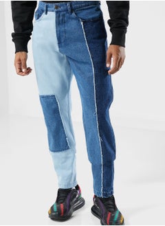 Buy Og Tapered Colour Block Denim Jeans in UAE