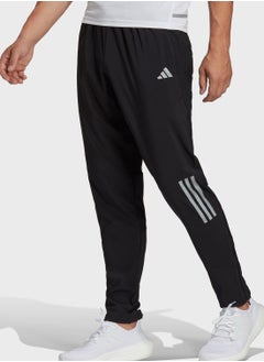 اشتري Own The Run Woven Astro Sweatpants في الامارات