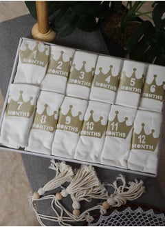 Buy A Set of 12 Barbitose for Newborns Decorated with the Names of the Months in Saudi Arabia