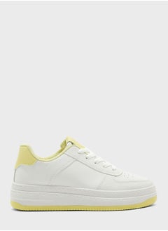 Buy Chunky Trainers In White With Yellow Tab in UAE