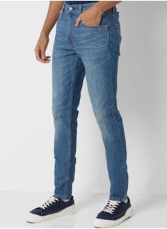 Buy Light Wash Tapered Jeans in UAE