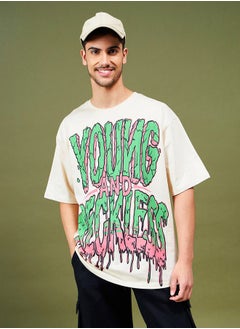 Buy Oversized Young & Reckless Graphic T-Shirt in Saudi Arabia