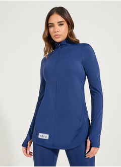 Buy Gymspire Edition- Label Zip Pockets Thumbhole Detail Longline Top in Saudi Arabia