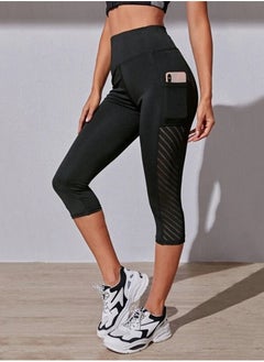 Buy Women's High Waisted Yoga Capri Pants With Side Pockets Stretch Mesh Workout Tummy Control Leggings For Sports in UAE