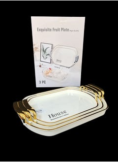 Buy A set of two-piece oval serving trays with an elegant wavy design, transparent/gold in Saudi Arabia