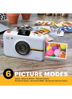 Buy Kodak Step Camera Instant Camera with 10MP Image Sensor, ZINK Zero Ink Technology, Classic Viewfinder, Selfie Mode, Auto Timer, Built-in Flash & 6 Picture Modes | White. in UAE