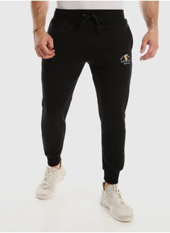 اشتري Side Pockets Slip On Cotton Sweatpants With Hem - Black في مصر