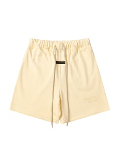 Buy FEAR OF GOD Essentials Silicone Sporty Mens Shorts Summer lemon yellow in Saudi Arabia