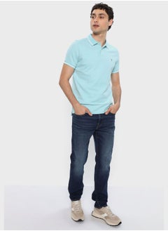 Buy Logo Slim Fit Pique Polo in UAE