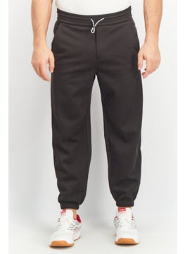 اشتري Men Regular Fit Solid Drawstring Jogger Pants, Black في السعودية