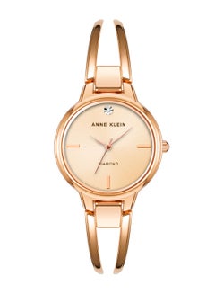 Buy Rose Gold Compliant Gold Round Watch in UAE