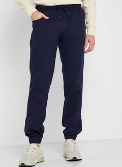 Buy Men Navy Blue Joggers Trousers in Saudi Arabia