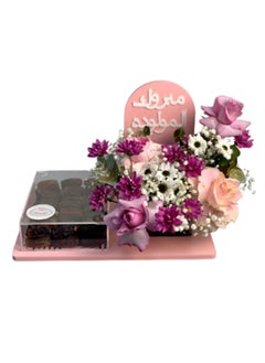 اشتري Baby Girl Flowers And Sweets Arrangement في الامارات