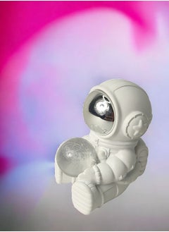 Buy Celestial Embrace - Astronaut Statue Embracing Luminous Moon | Unique Decor Piece in Egypt