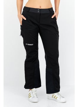 Buy Women Sportswear Fit Brand Logo Track Pants, Black in UAE