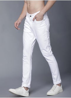 Buy Mid Rise Solid Jeans with Pockets in Saudi Arabia