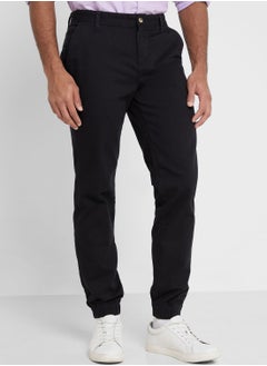 Buy Thomas Scott Men Black Solid Joggers Trousers in UAE