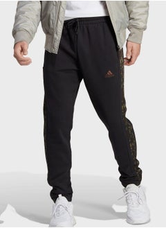 اشتري 3 Stripes French Terry Tapered Elastic Pants في الامارات