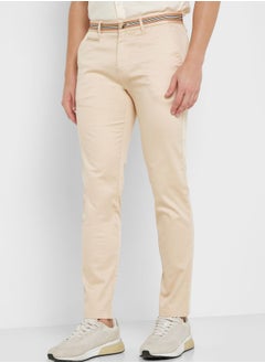 Buy Men Cream-Coloured Slim Fit Chinos Trousers in Saudi Arabia