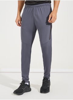 Buy Solid Knit Contrast Panel Tapered Trackpants in Saudi Arabia