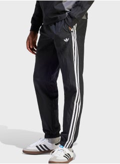 Buy Rekive Woven Tracksuit Bottoms in UAE