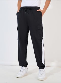 Buy Contrast Panel Oversized Cargo Pocket Joggers in Saudi Arabia