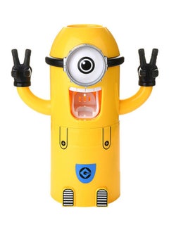 Buy Minions Toothbrush Holder Cum Toothpaste Dispenser Yellow/Black/White in UAE