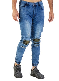 Buy Patched Ripped Denim Jeans Blue in UAE