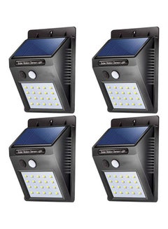 اشتري 4 قطع من مصابيح جدارية ليلية LED مكونة من 20 ضوء تعمل بالطاقة الشمسية للاستخدام الخارجي ومزودة بجهاز استشعار للحركة PIR أسود/ أبيض 10x12سم في الامارات
