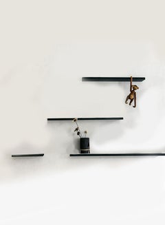 Buy 4-Piece  Wall Decorative Shelves Black in UAE