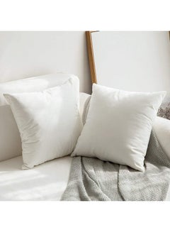 Buy 4-Piece Velvet Decorative Solid Filled Cushion Set Pure White 45x45cm in Saudi Arabia