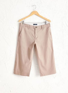 Buy Solid Pattern Shorts Beige in Saudi Arabia