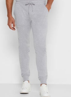 Buy Slim Fit Mid Rise Jersey Joggers Grey in UAE