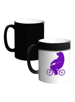 Buy Bear Riding Cycle Printed Magic Coffee Mug White/Purple/Black in Egypt