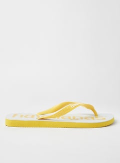 Buy Logo Mania Flip Flops Gold Yellow in Saudi Arabia